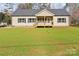 Charming single-story home featuring a welcoming front porch and well-maintained lawn at 108 Sarah Ave, Newton, NC 28658