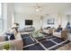 Comfortable living room with plush seating, ample space, and lots of natural light at 108 Sarah Ave, Newton, NC 28658