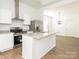 Modern kitchen island featuring granite countertops and stainless steel appliances at 1137 Williams St, Rock Hill, SC 29732