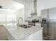 Modern kitchen featuring stainless steel appliances, granite countertops, and bright white cabinets at 1137 Williams St, Rock Hill, SC 29732