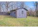 A one-car detached garage nestled in a backyard, providing secure parking and storage at 1200 Grace Ave, Kannapolis, NC 28083