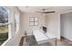 Bright bedroom featuring a ceiling fan, closet space, and lots of natural light at 1200 Grace Ave, Kannapolis, NC 28083