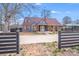 Charming home featuring blue siding, dormer windows, and a welcoming front porch with natural wood supports at 1200 Grace Ave, Kannapolis, NC 28083