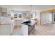 Bright kitchen featuring an island, modern cabinets, and stainless steel appliances at 1200 Grace Ave, Kannapolis, NC 28083