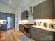 Well-equipped kitchen boasts stainless steel appliances and ample cabinet space at 1207 Lakedell Dr, Charlotte, NC 28215