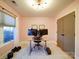 Bright home office with large desk, hardwood floors, and neutral walls at 1207 Lakedell Dr, Charlotte, NC 28215