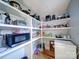 Pantry featuring white shelving for ample storage and organization at 1207 Lakedell Dr, Charlotte, NC 28215