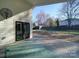 Covered patio area, featuring exterior view of backyard and shed at 1207 Lakedell Dr, Charlotte, NC 28215