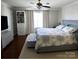 Serene bedroom featuring a comfortable bed, soft lighting, and ample storage space at 12123 Monteith Grove Dr, Huntersville, NC 28078