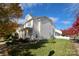 A well-maintained home with a lush lawn and charming front porch, ideal for relaxed living at 12123 Monteith Grove Dr, Huntersville, NC 28078
