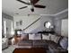 Spacious living room with stylish decor, comfortable seating, and hardwood floors at 12123 Monteith Grove Dr, Huntersville, NC 28078