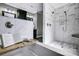 Marble tiled shower with multiple shower heads, built-in niche, and sleek fixtures at 125 Arrow Point Ln, Davidson, NC 28036