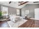 Main bedroom with high ceilings, large windows, and neutral decor for a serene retreat at 125 Arrow Point Ln, Davidson, NC 28036