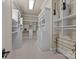 Spacious walk-in closet with built-in shelving and storage at 134 Larkhaven Ln, Mooresville, NC 28117