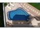 Aerial view showcases a custom-designed pool with ample lounging and well-kept landscaping at 134 Larkhaven Ln, Mooresville, NC 28117