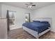 Cozy bedroom with a large window and wood-look flooring at 158 Crimson Orchard Dr, Mooresville, NC 28115