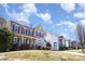 A lovely two-story home showcases a timeless facade, complete with a cozy front porch and well-maintained landscaping at 158 Crimson Orchard Dr, Mooresville, NC 28115