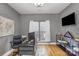 Cozy home office with a desk, chair, and natural light from the window at 158 Crimson Orchard Dr, Mooresville, NC 28115