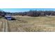 Sprawling land with outbuildings and barns, ideal for a farm or ranch, offering peace and privacy at 169 Eagle Mills Rd, Harmony, NC 28634