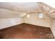 Spacious attic area with two windows and ample space, waiting for your renovation ideas at 169 Eagle Mills Rd, Harmony, NC 28634