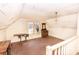 Attic living area filled with light is ready to be transformed into a bedroom or office at 169 Eagle Mills Rd, Harmony, NC 28634