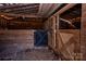 Wooden barn interior with stalls at 169 Eagle Mills Rd, Harmony, NC 28634
