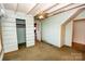 Small bedroom with closet has a ceiling fan and natural light; awaiting your unique style at 169 Eagle Mills Rd, Harmony, NC 28634