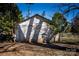 Exterior view of detached garage with basketball hoop at 169 Eagle Mills Rd, Harmony, NC 28634