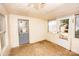 Cozy sunroom with multiple windows; perfect for enjoying the outdoors from inside your home at 169 Eagle Mills Rd, Harmony, NC 28634