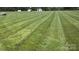 Lawn showing professionally maintained turf at 169 Eagle Mills Rd, Harmony, NC 28634