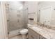 Modern bathroom with glass-enclosed shower, tiled walls, and granite vanity at 1766 15Th Street Ne Pl, Hickory, NC 28601