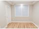 Minimalist bedroom with hardwood floors, natural light, and neutral color palette at 1766 15Th Street Ne Pl, Hickory, NC 28601