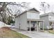 Two-story home with a front porch, long driveway, and a small storage building in the backyard at 1766 15Th Street Ne Pl, Hickory, NC 28601