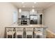 Bright kitchen featuring a granite island, stainless steel appliances, and pendant lighting at 1766 15Th Street Ne Pl, Hickory, NC 28601