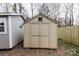 Outdoor shed has double doors, a window, and neutral color siding at 1766 15Th Street Ne Pl, Hickory, NC 28601