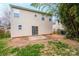 The backyard features a brick patio, a sliding glass door, and privacy from bamboo at 1991 9Th Street Se Pl, Hickory, NC 28602