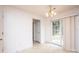 Bright dining area with sliding glass doors, a chandelier, and a neutral color scheme at 1991 9Th Street Se Pl, Hickory, NC 28602