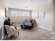 Comfortable bedroom with neutral colors, carpet, and artwork at 2033 Folkstone Ln, Indian Land, SC 29720
