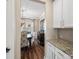 View of dining room from kitchen, featuring chandelier, buffet, and seating for six at 2033 Folkstone Ln, Indian Land, SC 29720