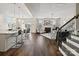 Spacious living area showcases an open layout with views of the kitchen and fireplace at 2033 Folkstone Ln, Lancaster, SC 29720