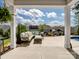Stylish outdoor covered patio with comfortable seating and view of backyard at 2033 Folkstone Ln, Indian Land, SC 29720