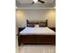 Cozy bedroom with gray walls, ceiling fan, and king bed creates a relaxing retreat at 2049 Winding Oak Rd, Rock Hill, SC 29732