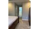 Spacious bedroom with neutral carpeting, en suite bathroom, and closet storage is comfortable and serene at 2049 Winding Oak Rd, Rock Hill, SC 29732