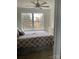 Cozy bedroom with large window and neutral decor at 2049 Winding Oak Rd, Rock Hill, SC 29732