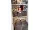 Organized linen closet with neatly stacked towels and storage containers at 2049 Winding Oak Rd, Rock Hill, SC 29732