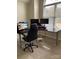Functional office area with a corner desk setup and large window at 2049 Winding Oak Rd, Rock Hill, SC 29732
