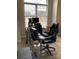 Office space featuring a large desk, office chair, computer, and window at 2049 Winding Oak Rd, Rock Hill, SC 29732