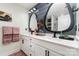 Modern bathroom with dual sinks, black fixtures, and stylish decor at 2130 Blewett Dr, Charlotte, NC 28269