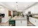 Open concept kitchen features a large island with bar seating and stylish pendant lighting at 2130 Blewett Dr, Charlotte, NC 28269