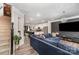 Spacious open-concept living room with luxury flooring, modern lighting, and stylish decor at 2130 Blewett Dr, Charlotte, NC 28269